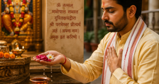 A devotee taking a holy vow (Sankalpa) with water and flowers in hand.