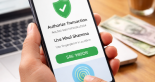 A person using a fingerprint sensor on a smartphone to authorize a secure digital bank transaction in India.