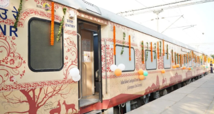 The Bharat Gaurav Deluxe AC Tourist Train parked at an Indian railway station prior to departure.