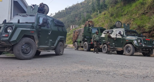 Indian security forces establishing a cordon in the forest areas of Rajouri during anti-terror operation.