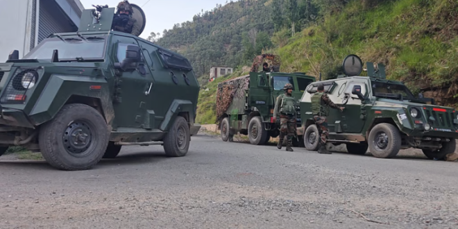 Indian security forces establishing a cordon in the forest areas of Rajouri during anti-terror operation.