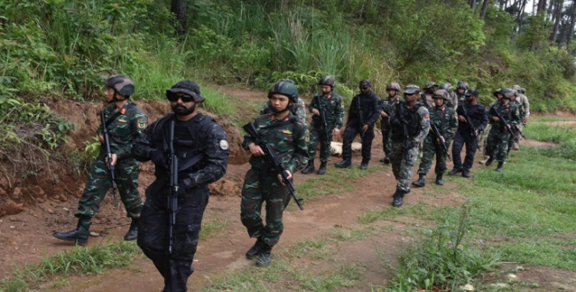 Soldiers from friendly foreign nations conducting mixed-team tactical jungle drills during the Pragati 2026 multinational military exercise at Umroi, Meghalaya.