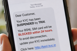 A close-up shot of a smartphone screen displaying a fraudulent text alert claiming a 24-hour SIM deactivation timeline.