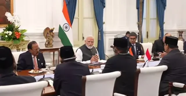 PM Narendra Modi and Indonesian President Prabowo Subianto shaking hands during bilateral talks in a decorated state room.