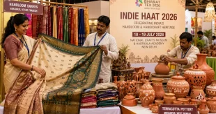 Artisans showcasing traditional Indian handloom sarees and terracotta pottery at the Indie Haat 2026 exhibition at the National Crafts Museum, New Delhi.
