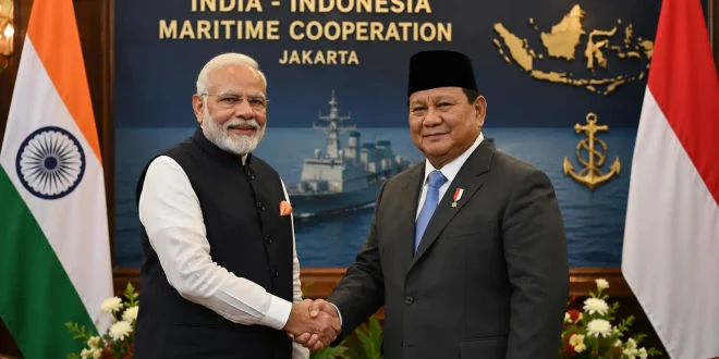 Prime Minister Narendra Modi shaking hands with Indonesian leadership, symbolizing bilateral maritime cooperation in Jakarta.