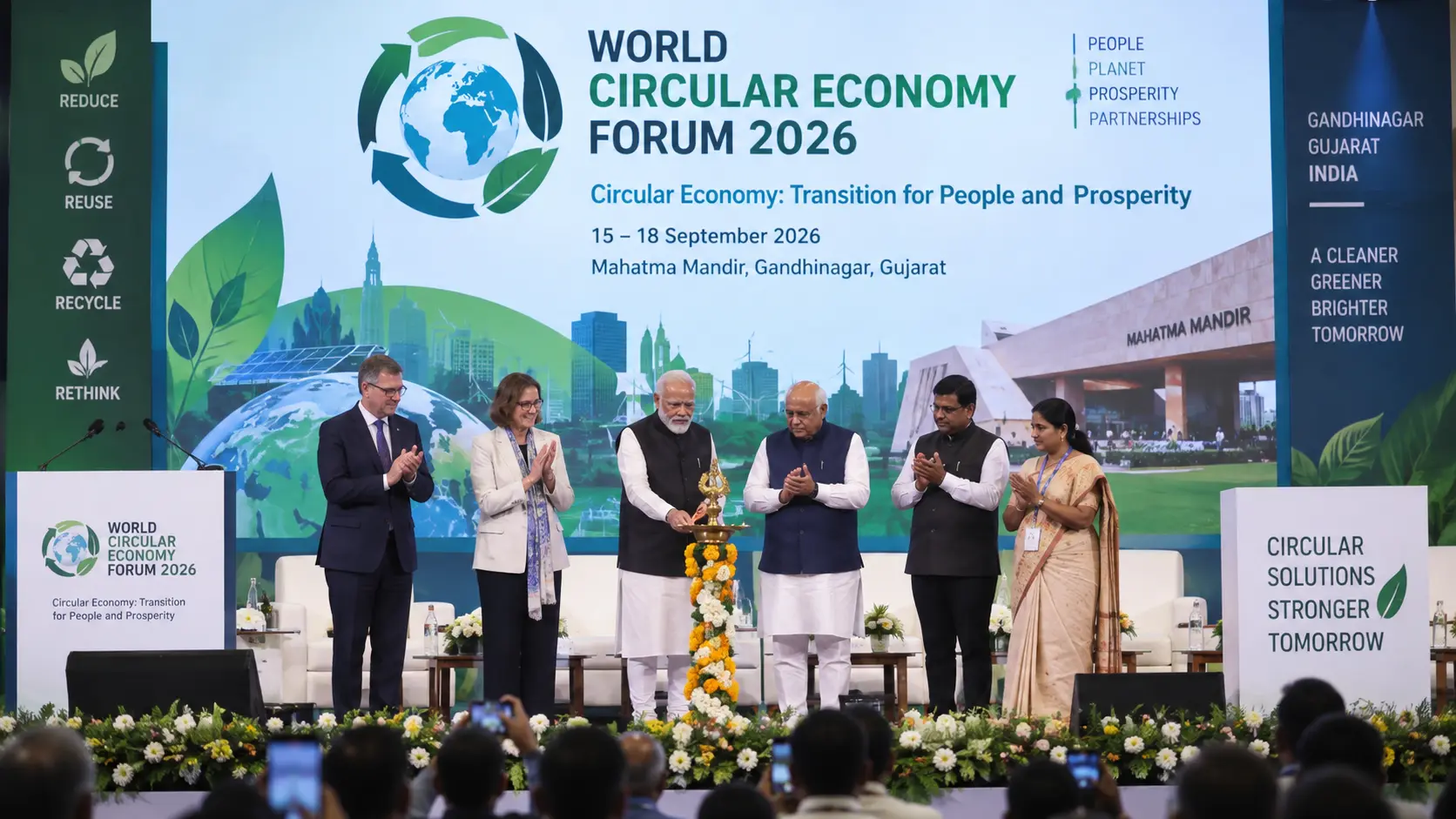 Dignitaries inaugurating the World Circular Economy Forum 2026 at Mahatma Mandir in Gandhinagar, Gujarat, displaying the theme 'Circular Economy: Transition for People and Prosperity'.